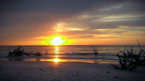 Scenic view of sea at sunset