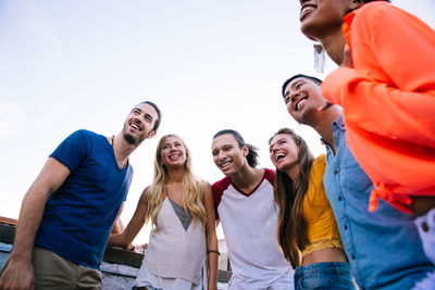 Group of people against sky