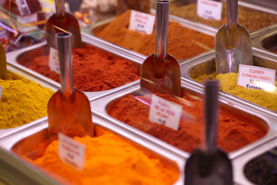 High angle view of various spices for sale at market