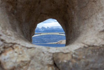 Sea seen through hole in rock