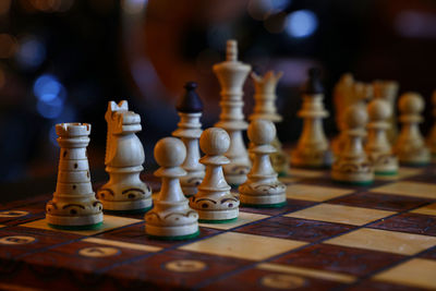 Close-up of chess pieces on board