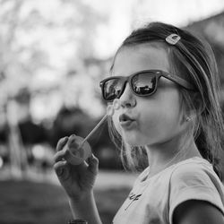 Portrait of woman holding cigarette