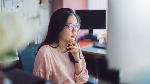 Young woman looking away