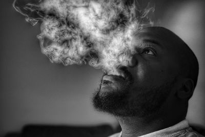 Close-up of man smoking