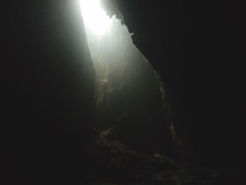 Low angle view of illuminated mountain against sky