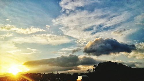 Sun shining through clouds