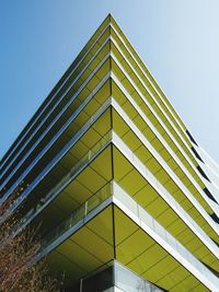 Low angle view of modern building against clear sky