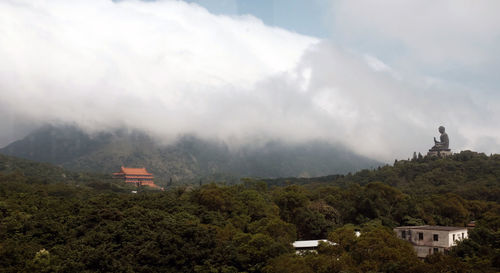 Landscape with mountain range in background