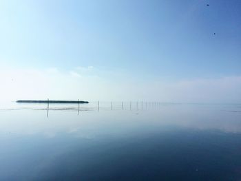 Scenic view of calm sea against sky