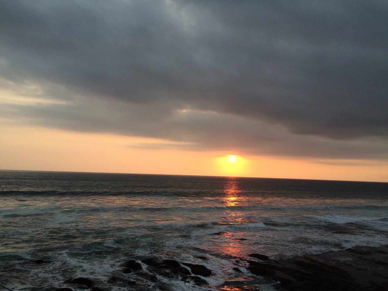 sea, sunset, water, horizon over water, sky, scenics, beauty in nature, tranquil scene, cloud - sky, tranquility, sun, waterfront, idyllic, nature, orange color, cloudy, cloud, rippled, seascape, wave