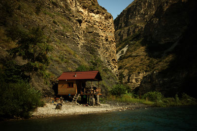 Gazebo by building on mountain