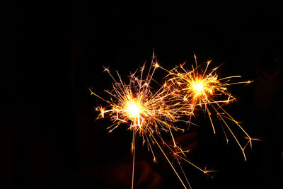 Firework display at night