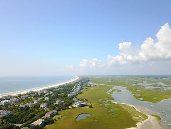 View of beach against blue sky