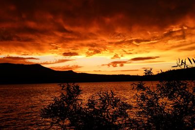 Scenic view of silhouette landscape against sky during sunset