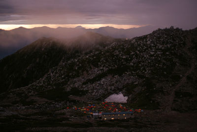 Scenic view of mountains against sky during sunset