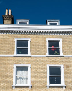 Low angle view of building against clear sky