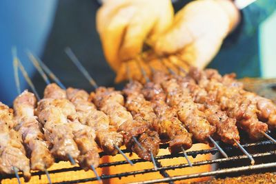 Close-up of meat on barbecue grill