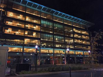 Illuminated railroad station at night