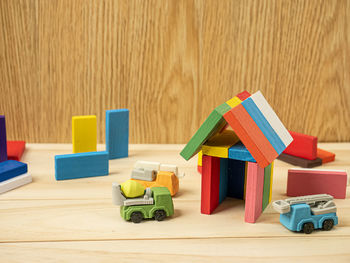 Close-up of toys on wooden table