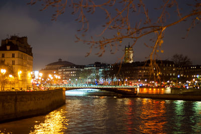 River passing through city at night
