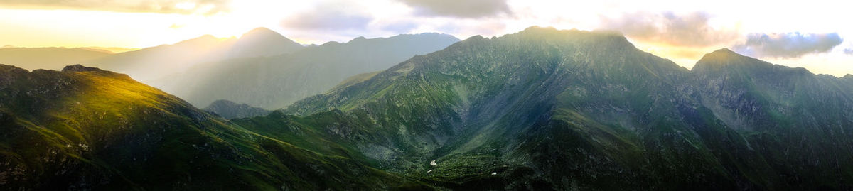 Sunrise on fagaras high mountain ridge. romanian mountain landscape with high peaks