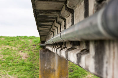 Close-up of built structure against sky