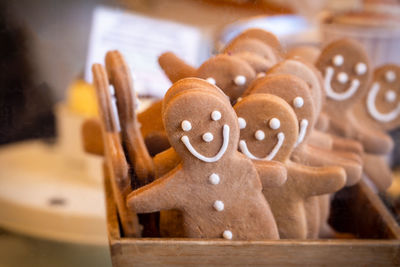 Close-up of gingerbread men cookies on a market stall