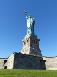 Statue of liberty against clear blue sky