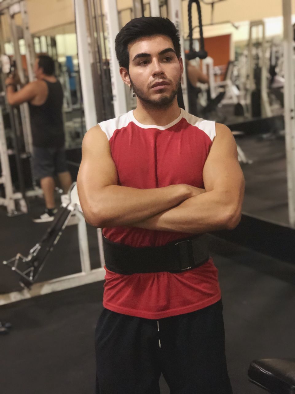 looking at camera, young men, portrait, one person, young adult, three quarter length, strength, indoors, standing, gym, healthy lifestyle, sports training, sport, exercising, lifestyles, front view, real people, focus on foreground