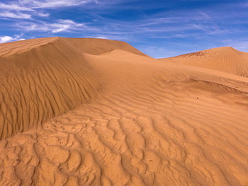 Scenic view of desert against sky