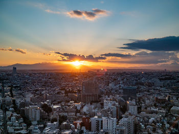 High angle view of townscape against sky during sunset