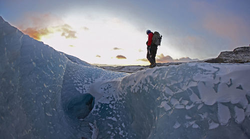 Mature man hiking on solheimajokull