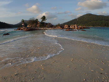 Scenic view of beach against sky