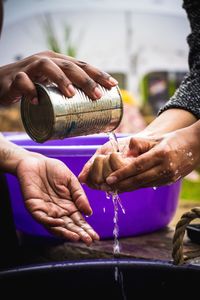 Izandla ziyagezana-the hands wash each other