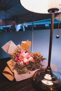 Close-up of rose on table
