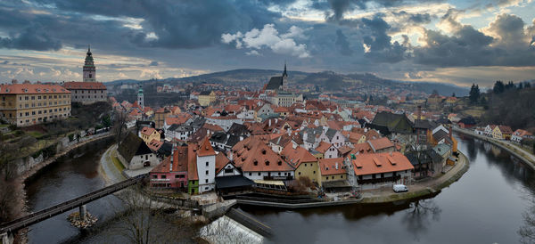 High angle view of river amidst buildings in town