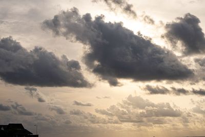 Low angle view of cloudy sky during sunset