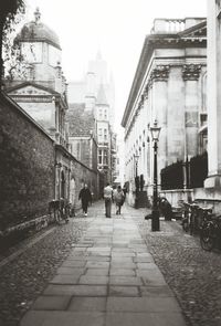 People walking on street in city