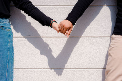 High angle view of couple holding hands