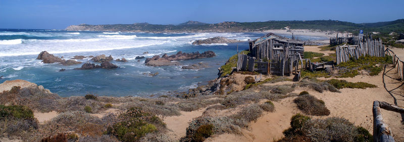 Panoramic view of beach against clear sky