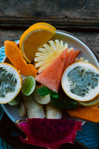 High angle view of fruits in plate on table