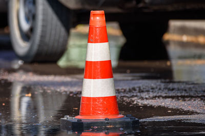 Close-up of red light on road