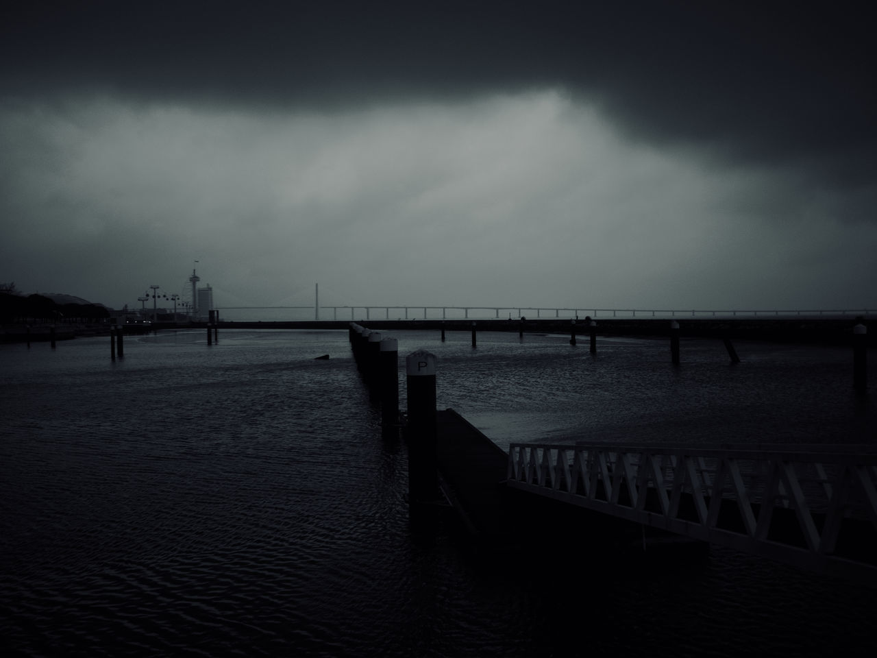 PIER ON SEA AGAINST SKY