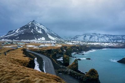 Scenic view of mountains against sky during winter