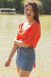 Model woman looking at camera during outdoors session