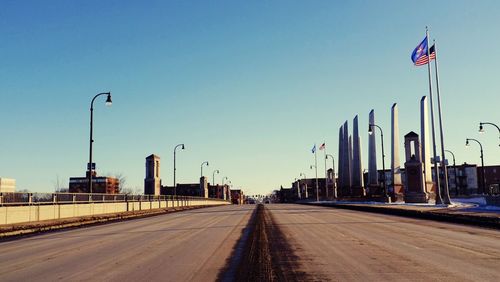 Street amidst buildings against sky