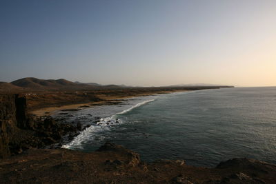 Scenic view of sea against clear sky