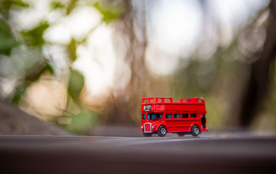 Close-up of toy car on road