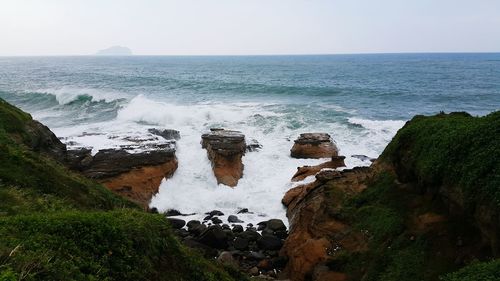 Scenic view of sea against clear sky