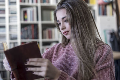 Young woman using phone